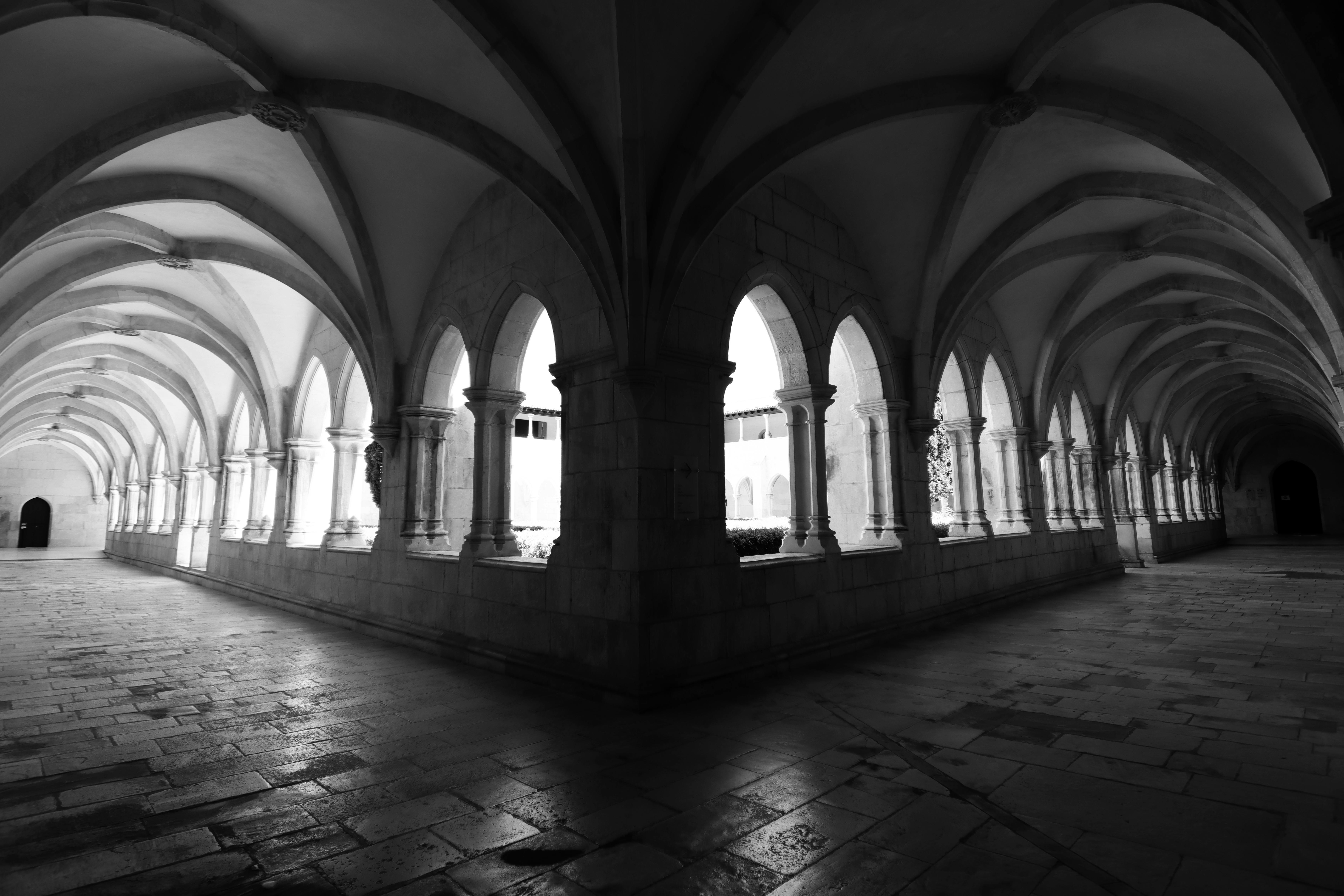 gothic cloister arches in batalha monastery