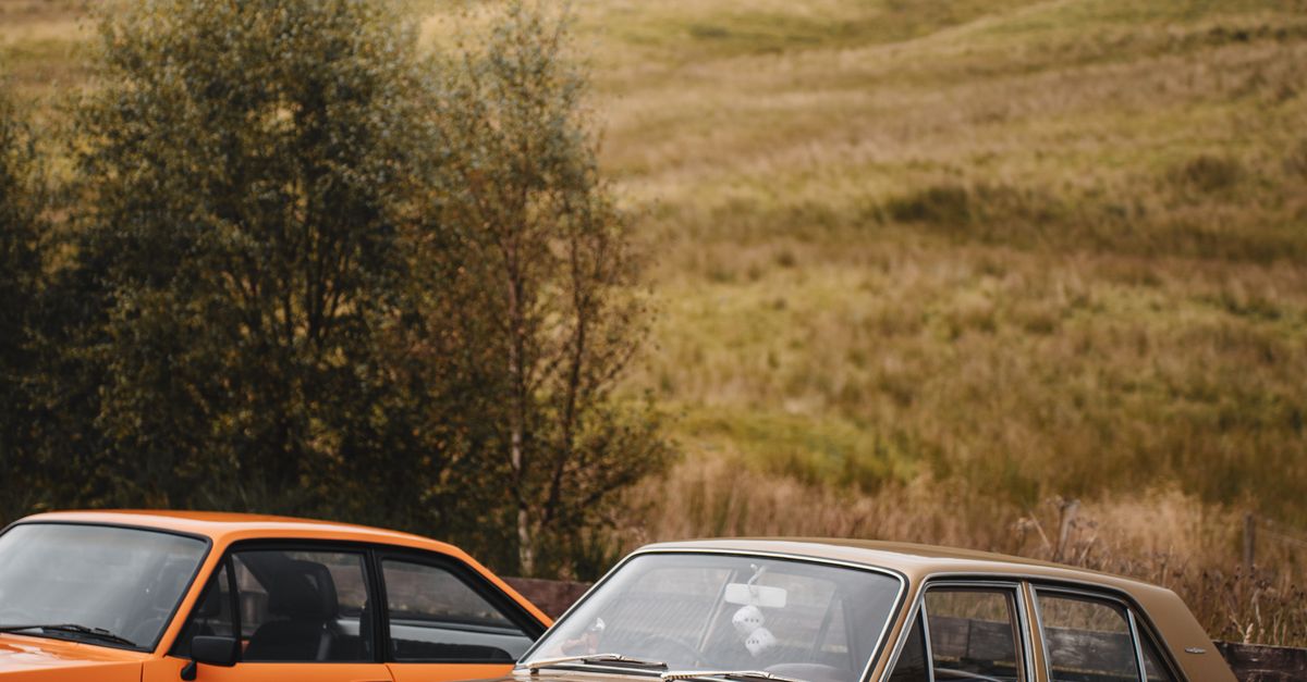 Car In Rural Setting Classic Cars in Scenic Countryside Setting · Free Stock Photo