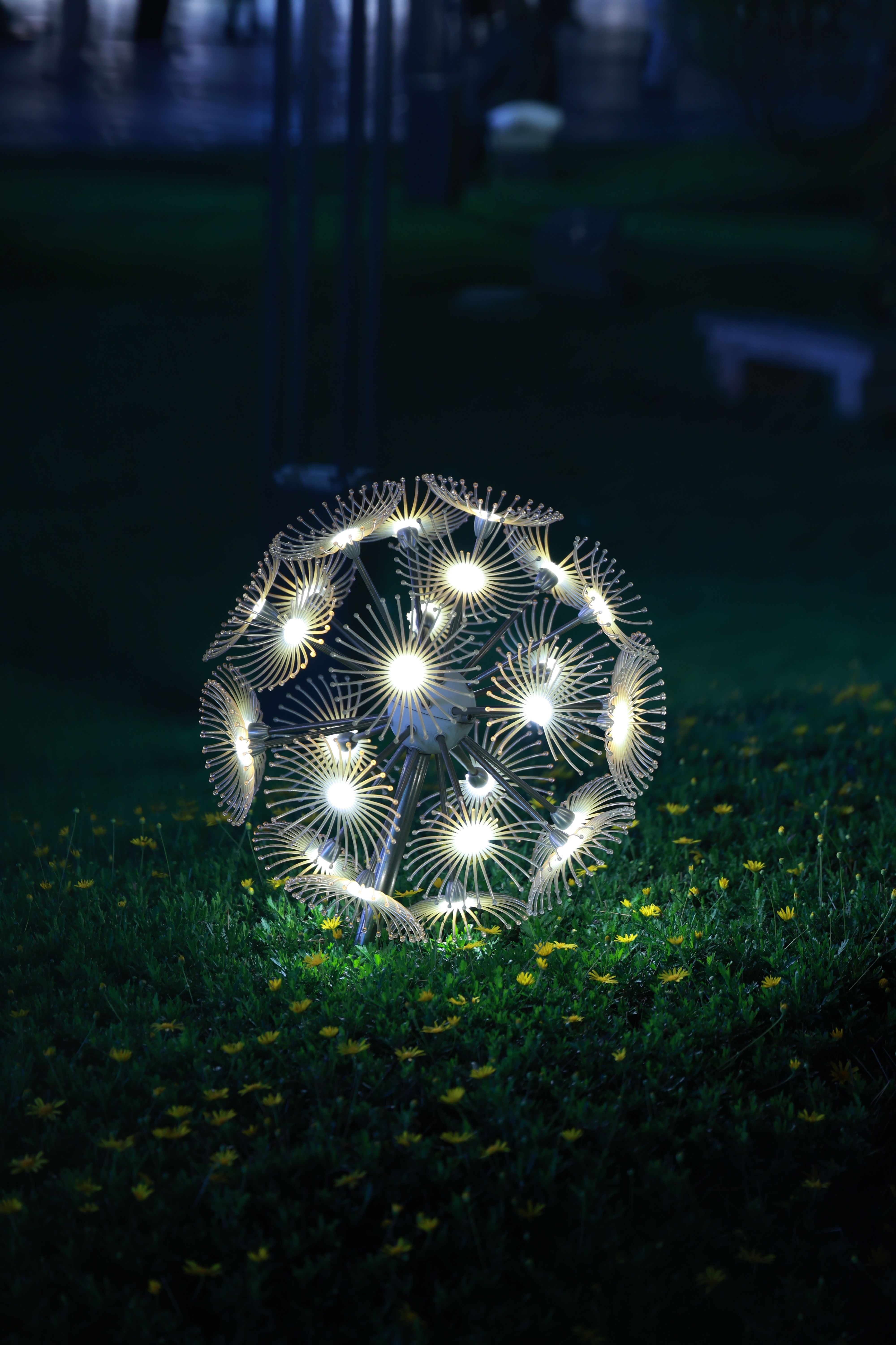 Illuminated Geometric Sculpture in Night Garden · Free Stock Photo