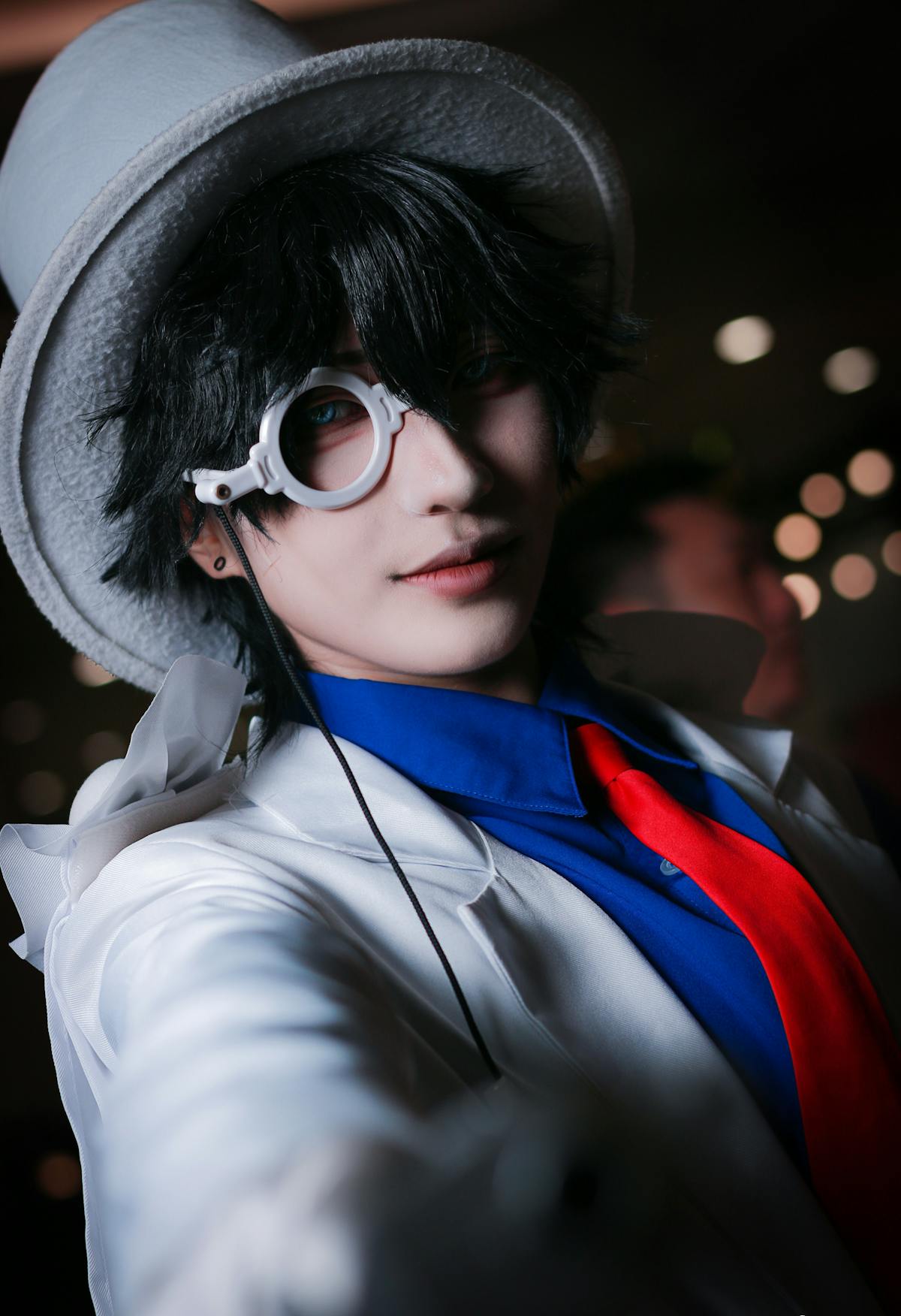 Small green frog sitting on vibrant leaf