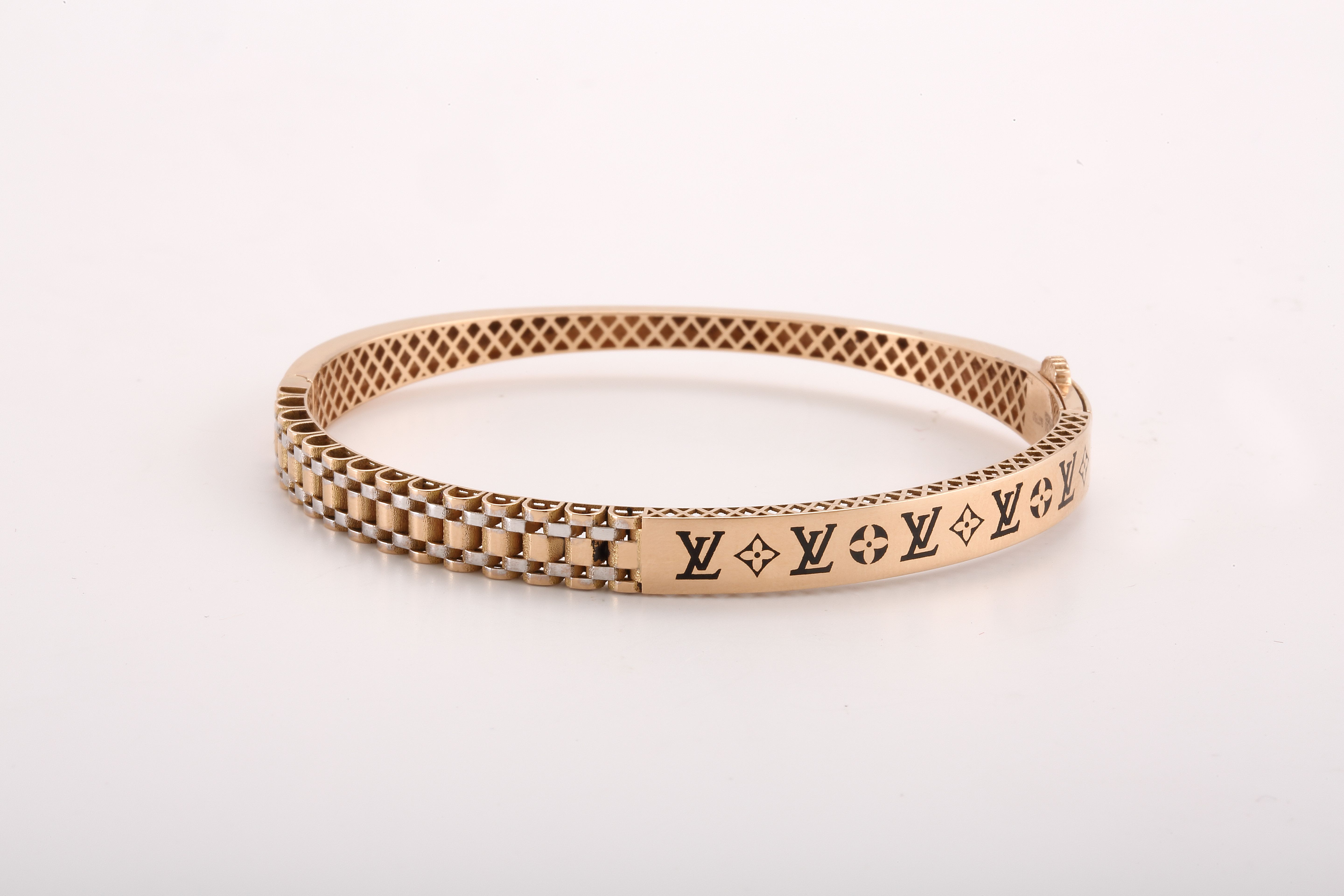 Elegant Gold Bracelet with Geometric Patterns · Free Stock Photo