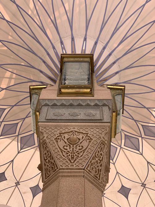 Free Close-up view of a detailed architectural column under a geometric patterned canopy. Stock Photo