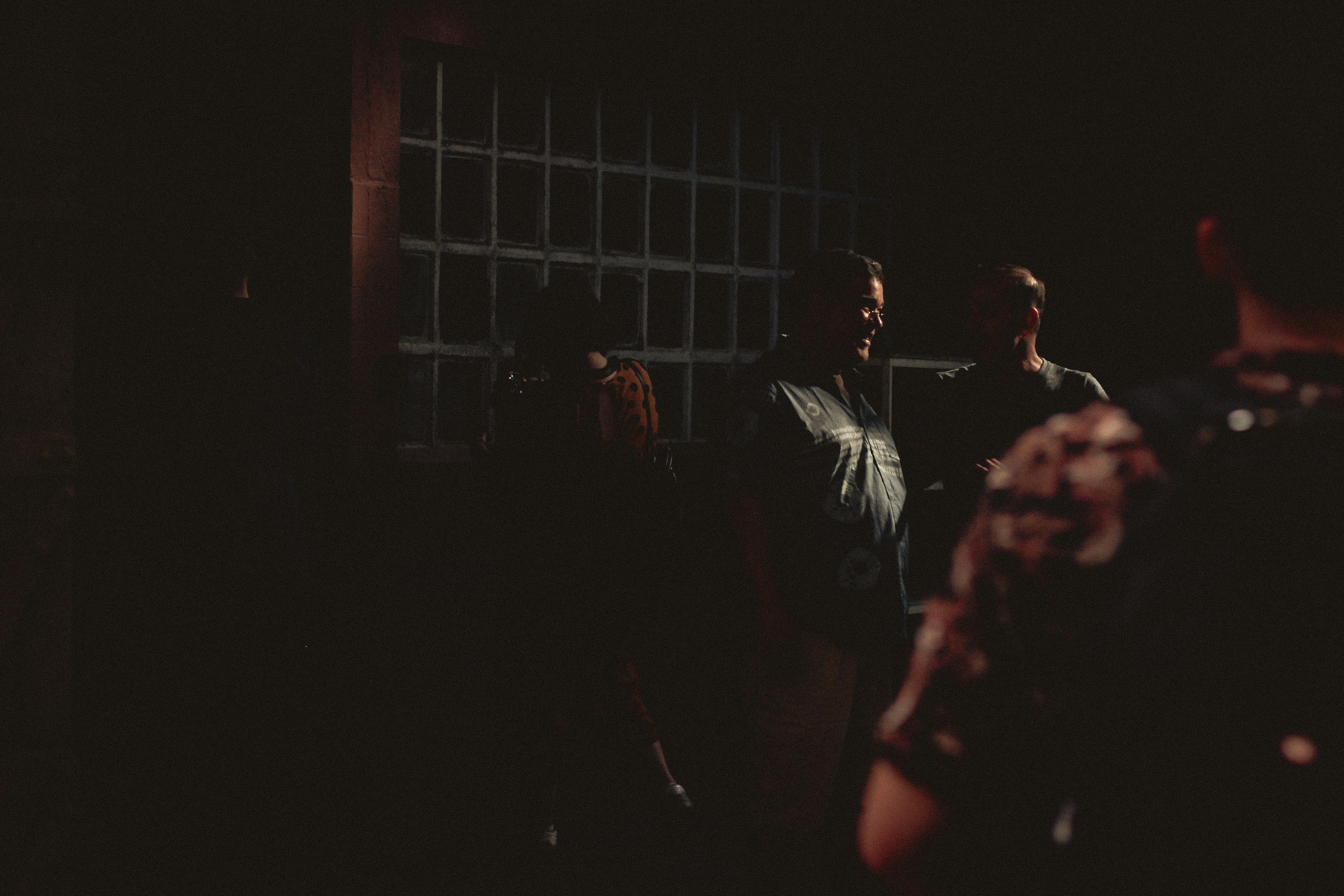 Group of People Inside a Dark Room · Free Stock Photo