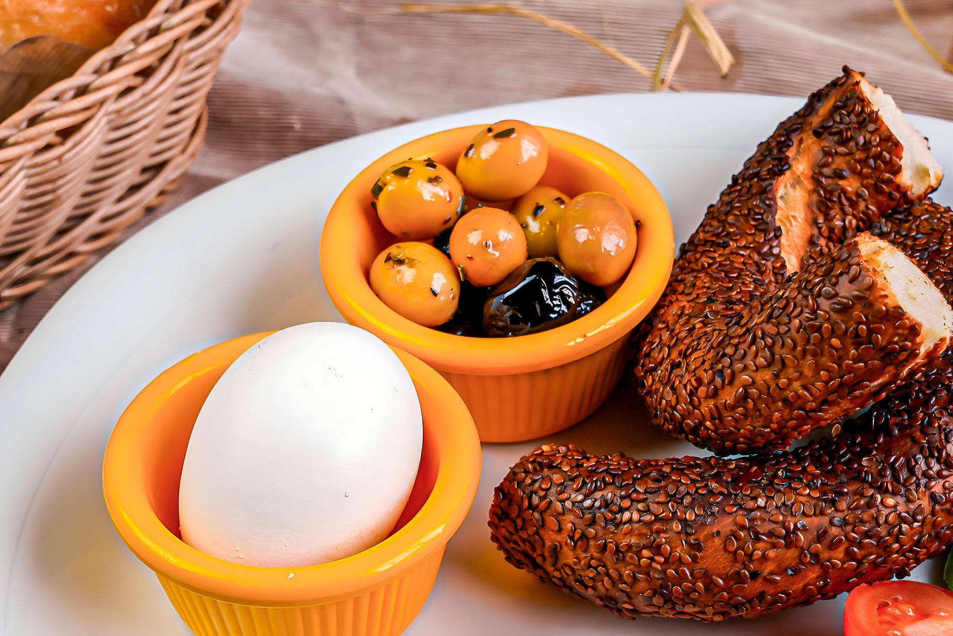 Fresh turkey eggs in a rustic basket with straw