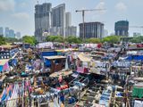 Laundry drying at Mahalaxmi's Dhobi Ghat, with the skyline behind
