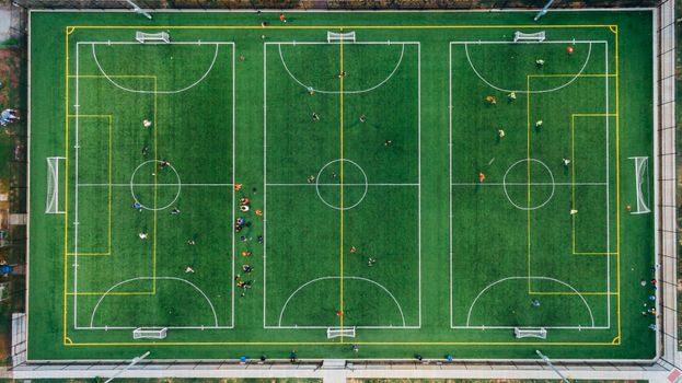 Aerial photo capturing an active soccer game on a sports field in Chattanooga.