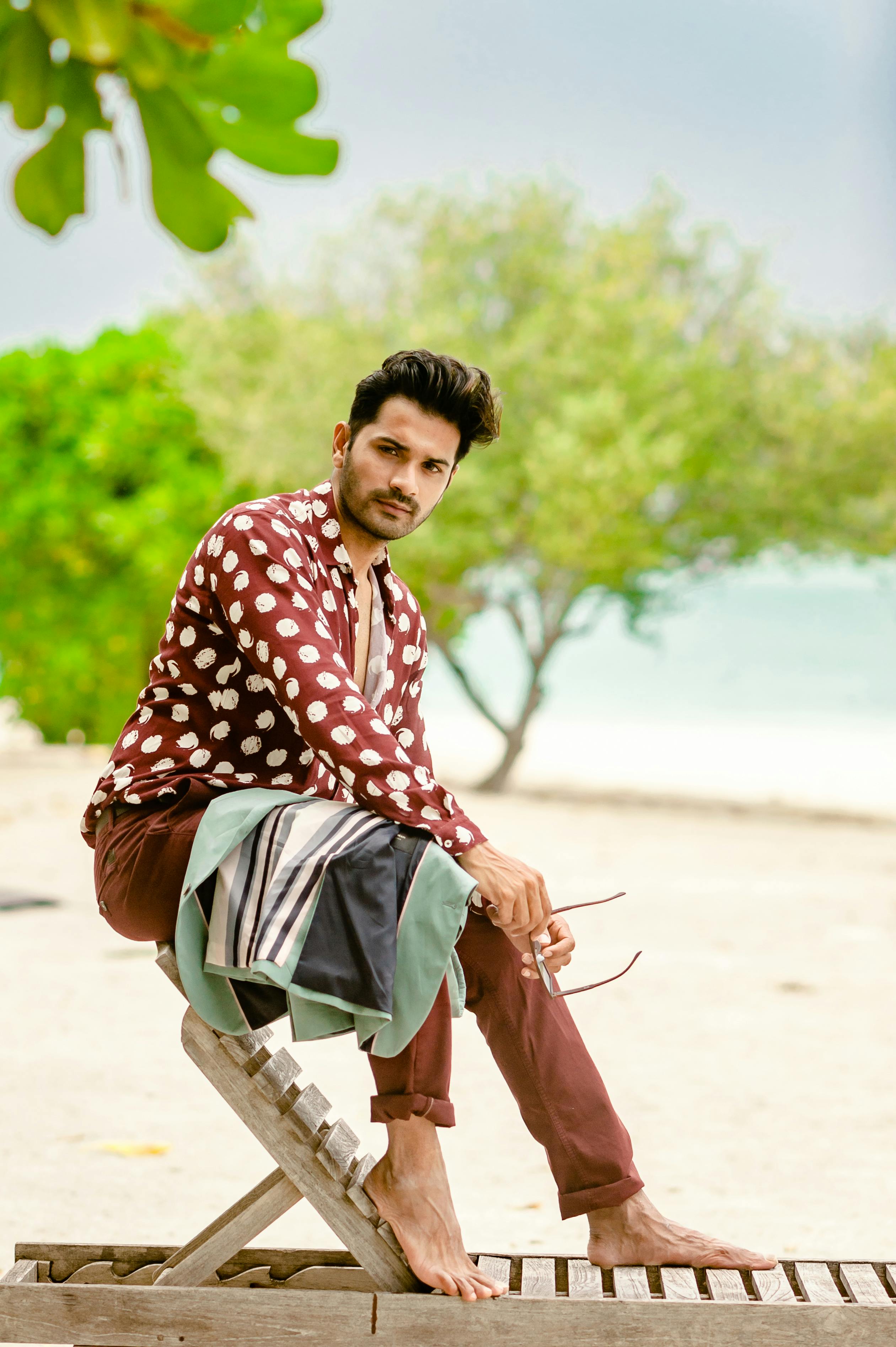 Stylish beach photoshoot featuring trendy fashion in the picturesque Maldives.
