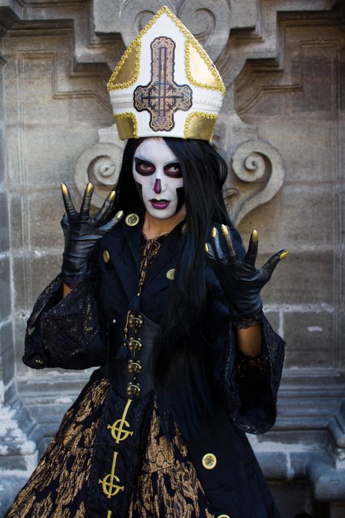 Free A person in elaborate gothic costume and makeup, posing dramatically. Stock Photo