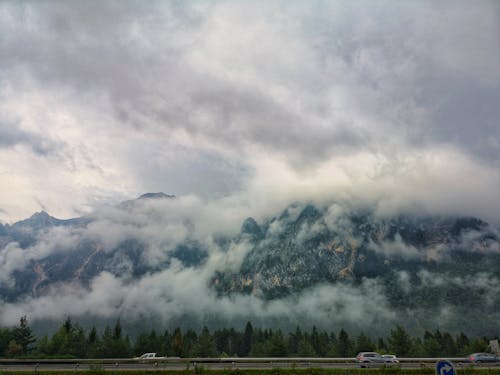 Free Rocky Mountain Under Cloudy Sky Stock Photo