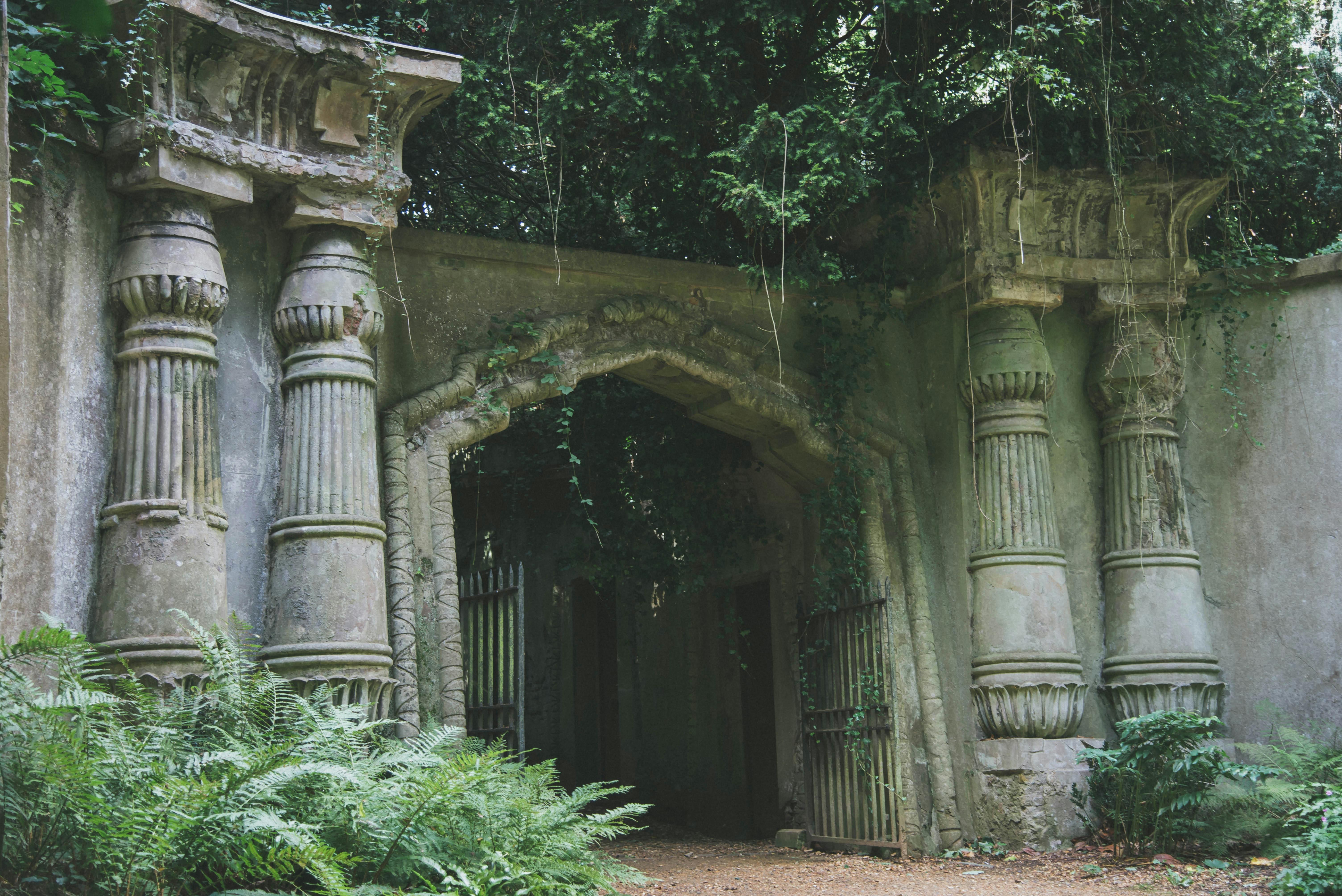 ancient ivy covered stone archway in england