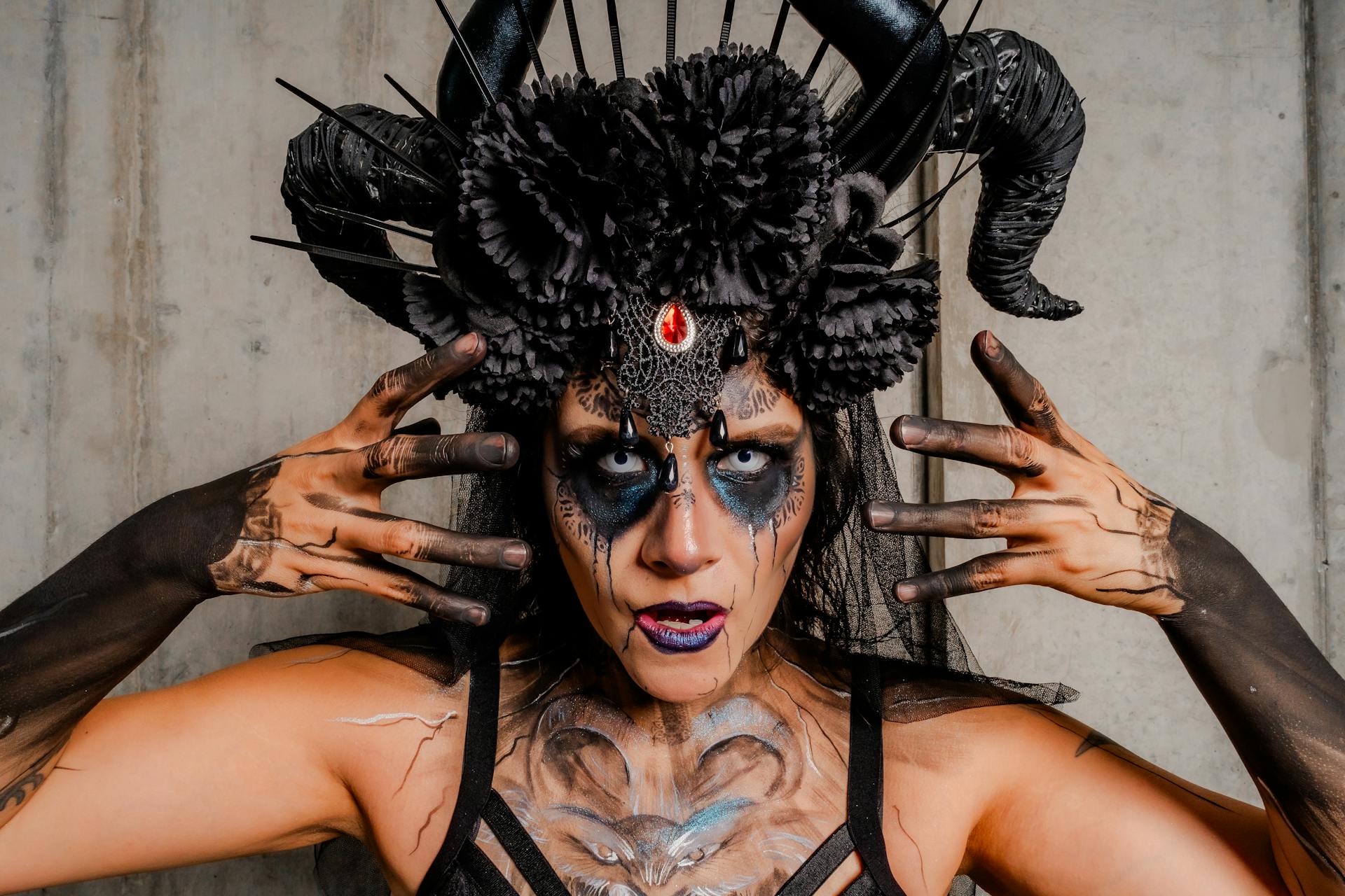 Striking surreal gothic makeup portrait featuring elaborate costume and fantasy elements in Mexico City.
