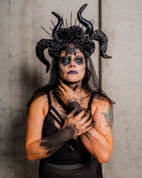 Free A surreal gothic portrait with intricate makeup and costume, perfect for Halloween. Stock Photo