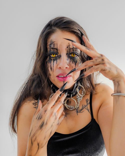 Free A creative portrayal of surreal makeup and horror cosplay with vivid details. Stock Photo