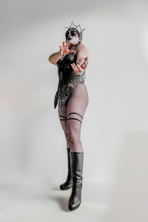Free Surreal portrait featuring gothic makeup and costume, evoking fantasy and horror elements. Stock Photo