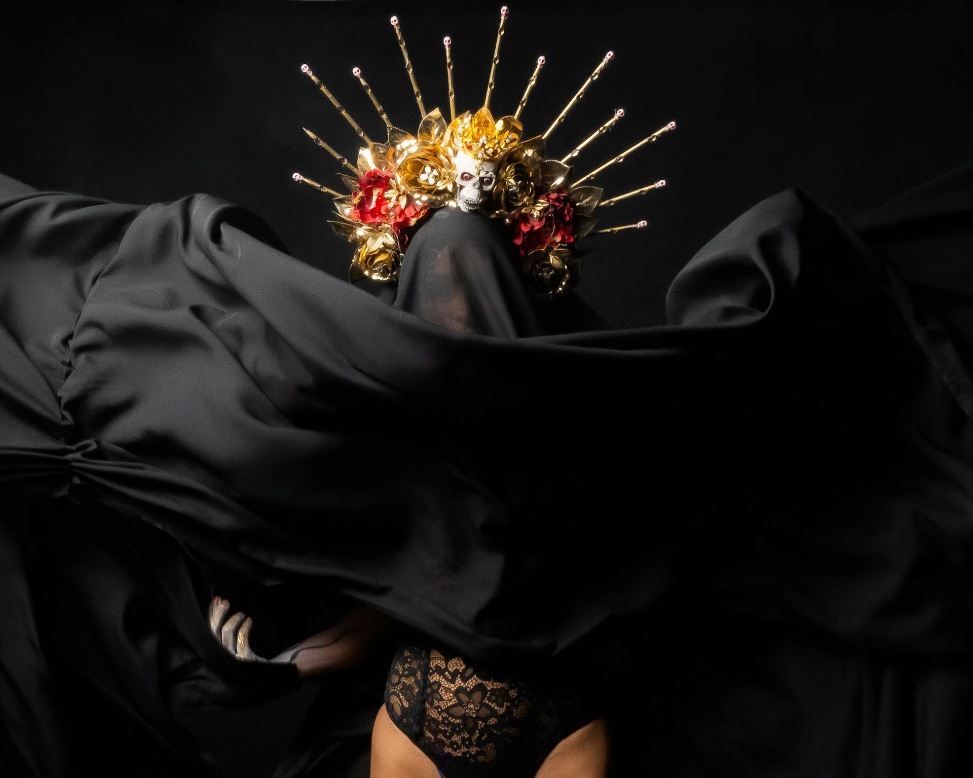 A stunning surreal portrait with gothic elements showcasing dramatic costume and makeup.