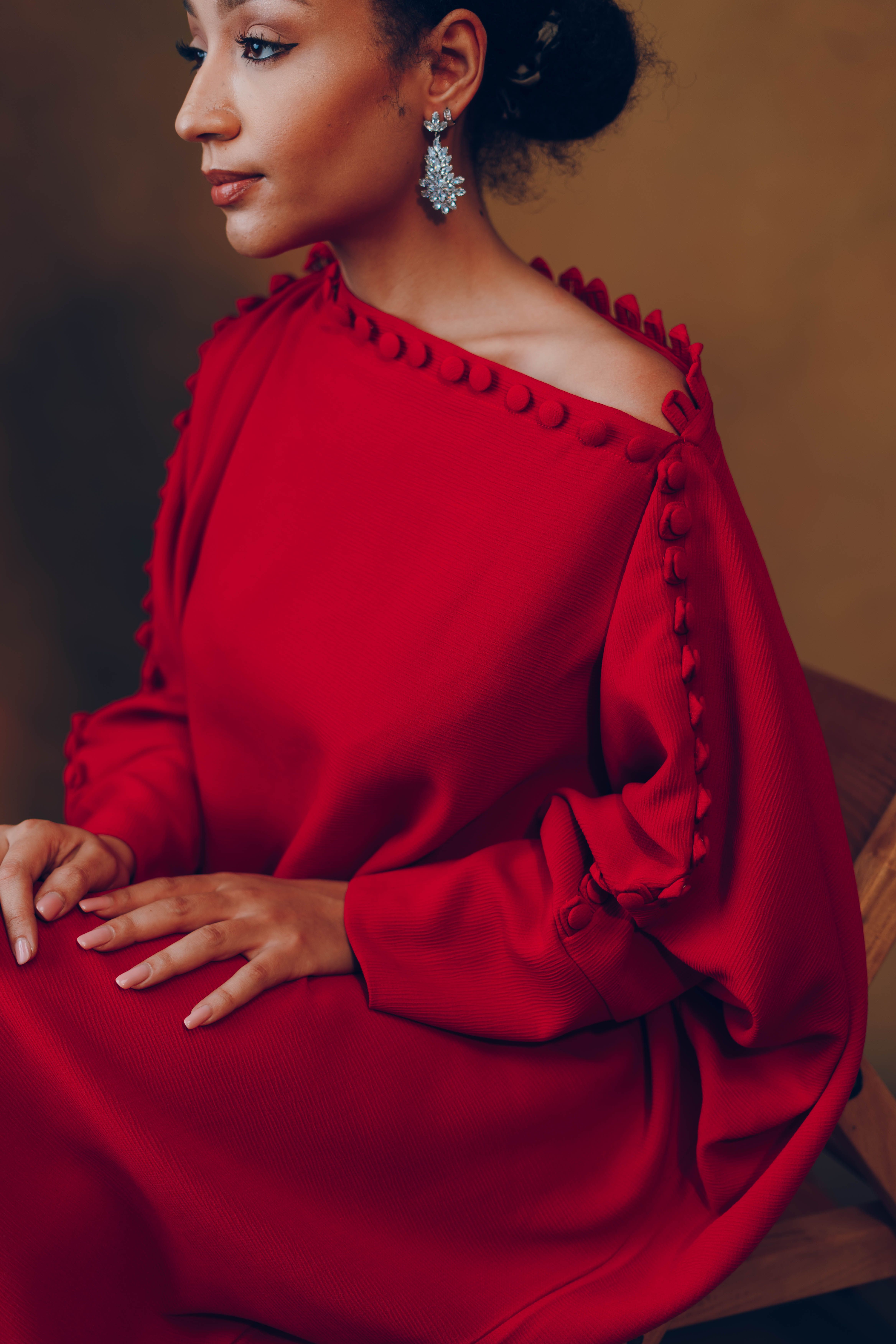 Elegant Woman In Red Dress With African Influences Free Stock Photo