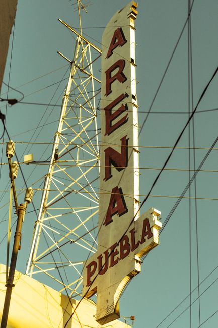 Vintage Arena Puebla sign with a clear sky background in Heroica Puebla de Zaragoza, Mexico.