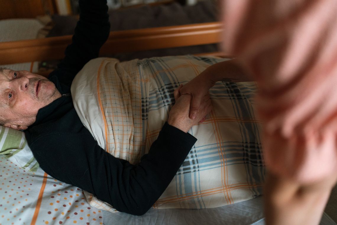 Caregiver offering compassionate recovery support at home