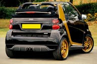 Yellow and Black 3-door Hatchback