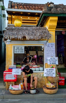Authentic street food stall in Hội An, featuring local cuisine and cultural charm.