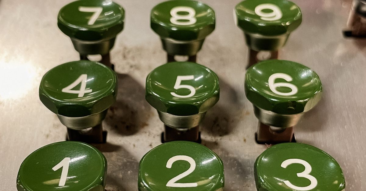 Vintage Mechanical Cash Register Keypad Close-Up · Free Stock Photo