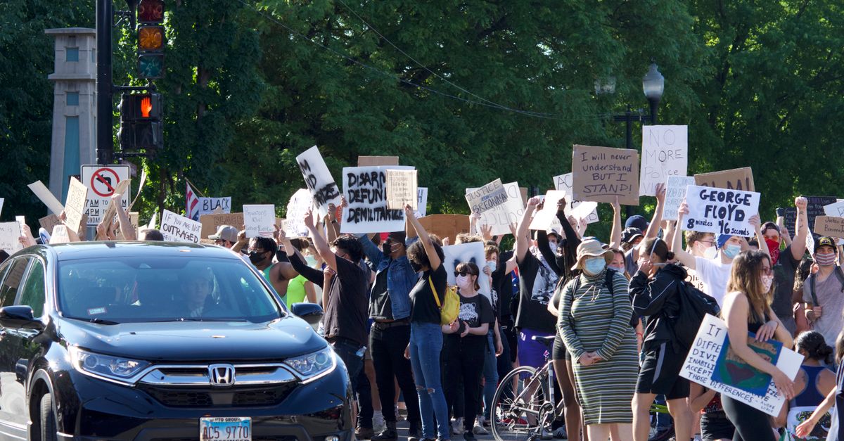 Protesting Images Large Protest with Handwritten Signs on Urban Street · Free Stock Photo