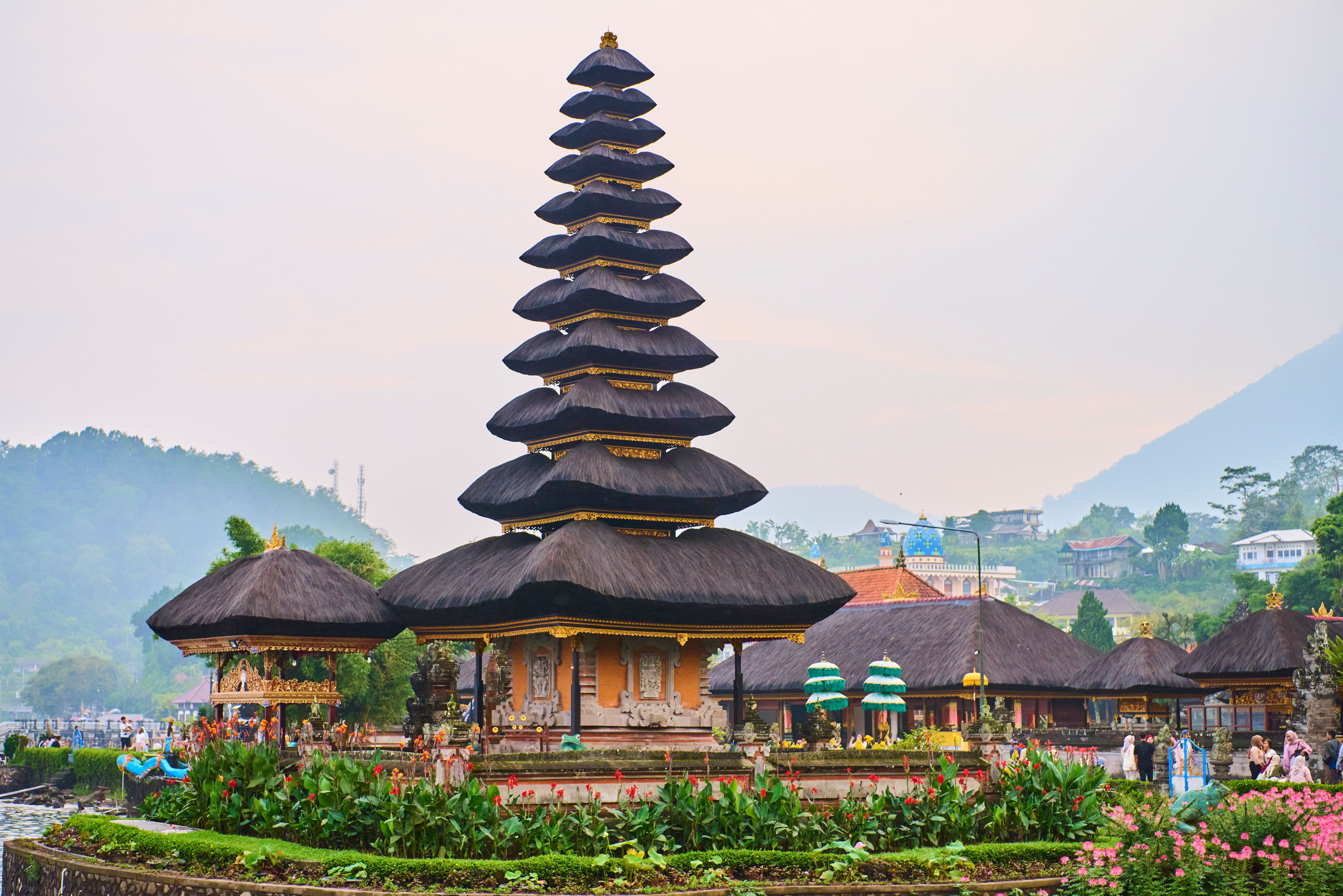 Tirta Empul water temple purification pools in Bali with carved stone spouts