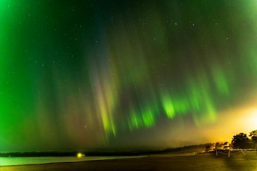 Free Aurora Borealis illuminates the night sky in Pori, Finland's natural landscape. Stock Photo
