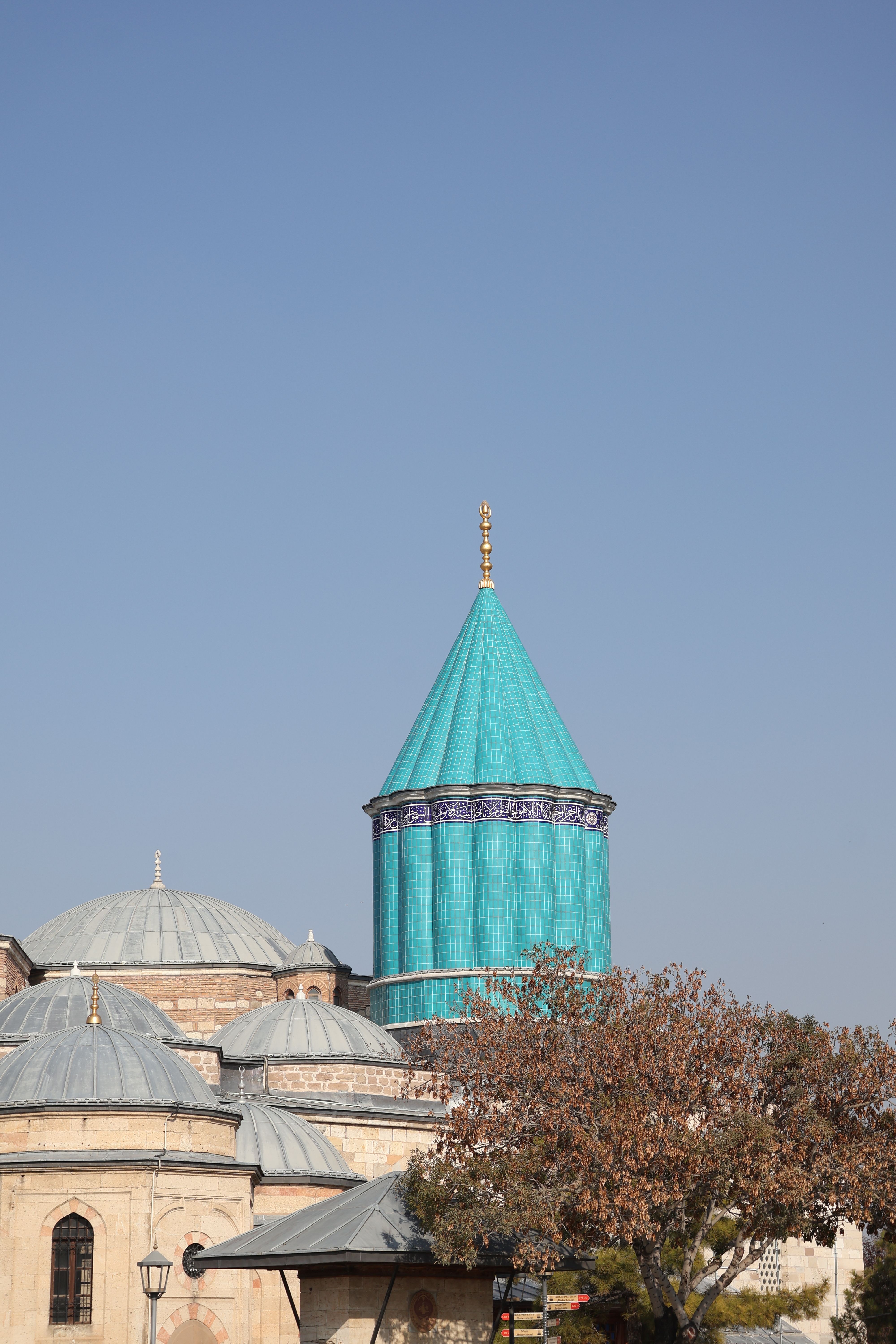 A stunning view of the Mevlana Museum's turquoise dome in Konya, Turkey.