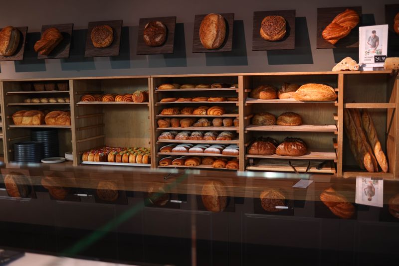 Golden sourdough loaf on the counter at Best Bakery 2026