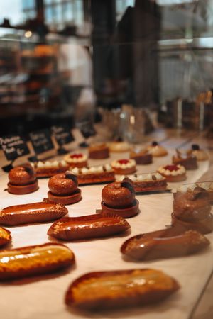 Artisan pastries in a bakery display — photo by Valeria Boltneva on Pexels