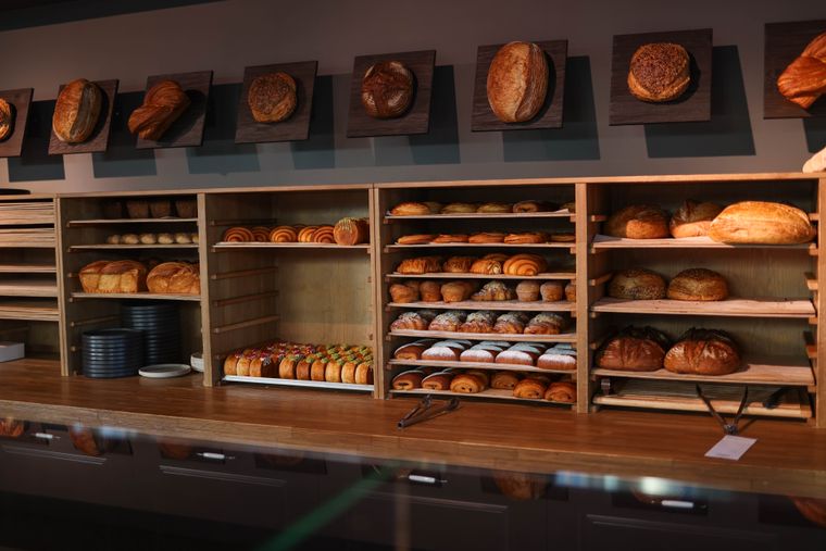 Fresh bread and pastries in an artisan bakery, photo by Valeria Boltneva on Pexels
