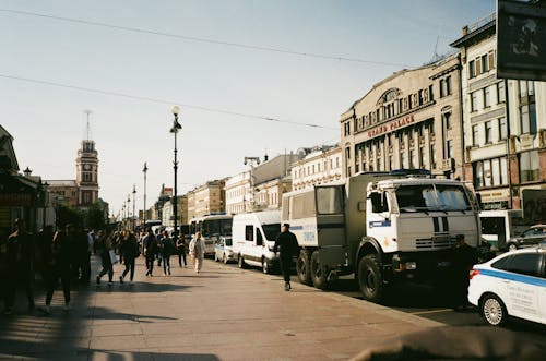 People Walking on Sidewalk