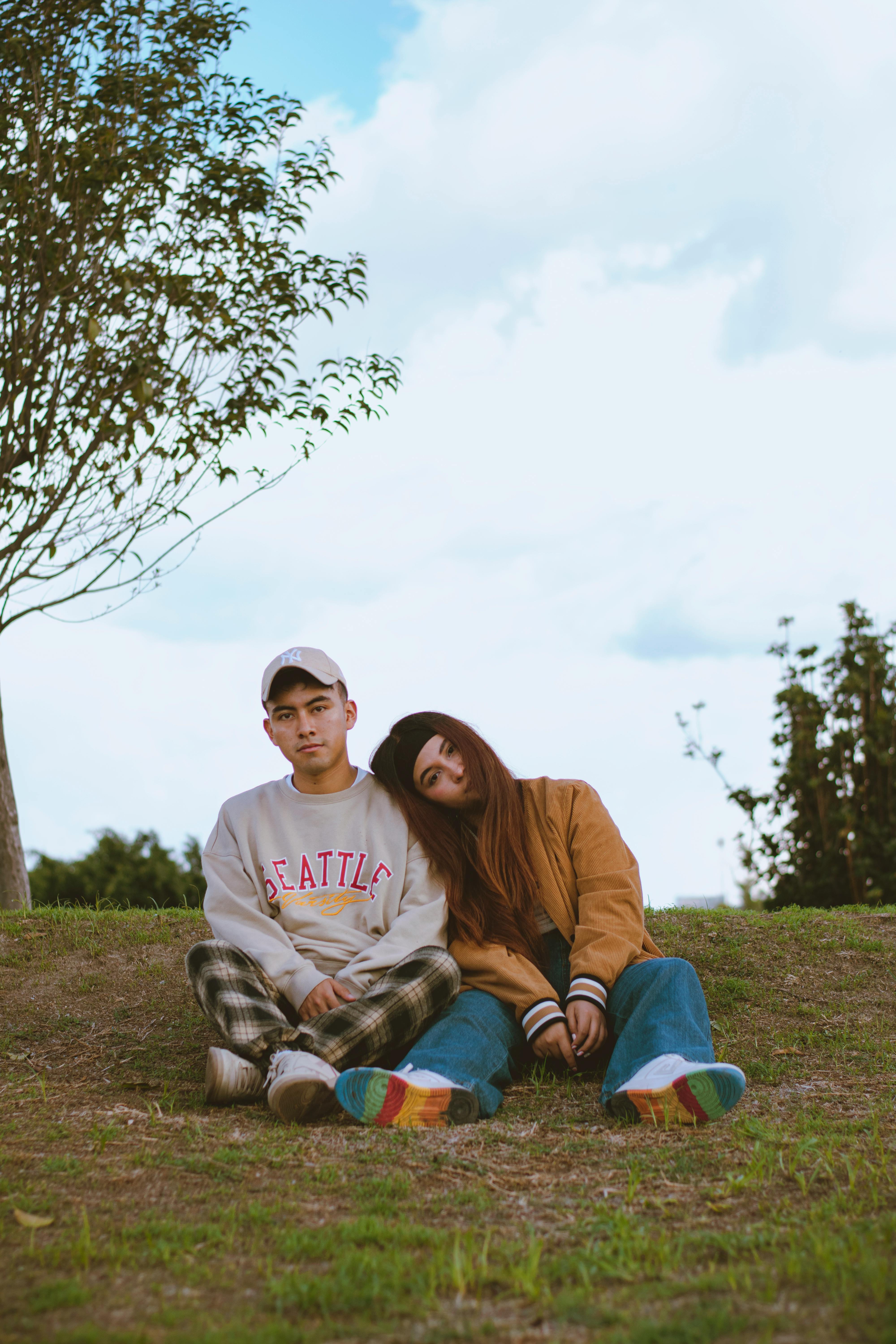 Person contemplating dating app choices on phone screen