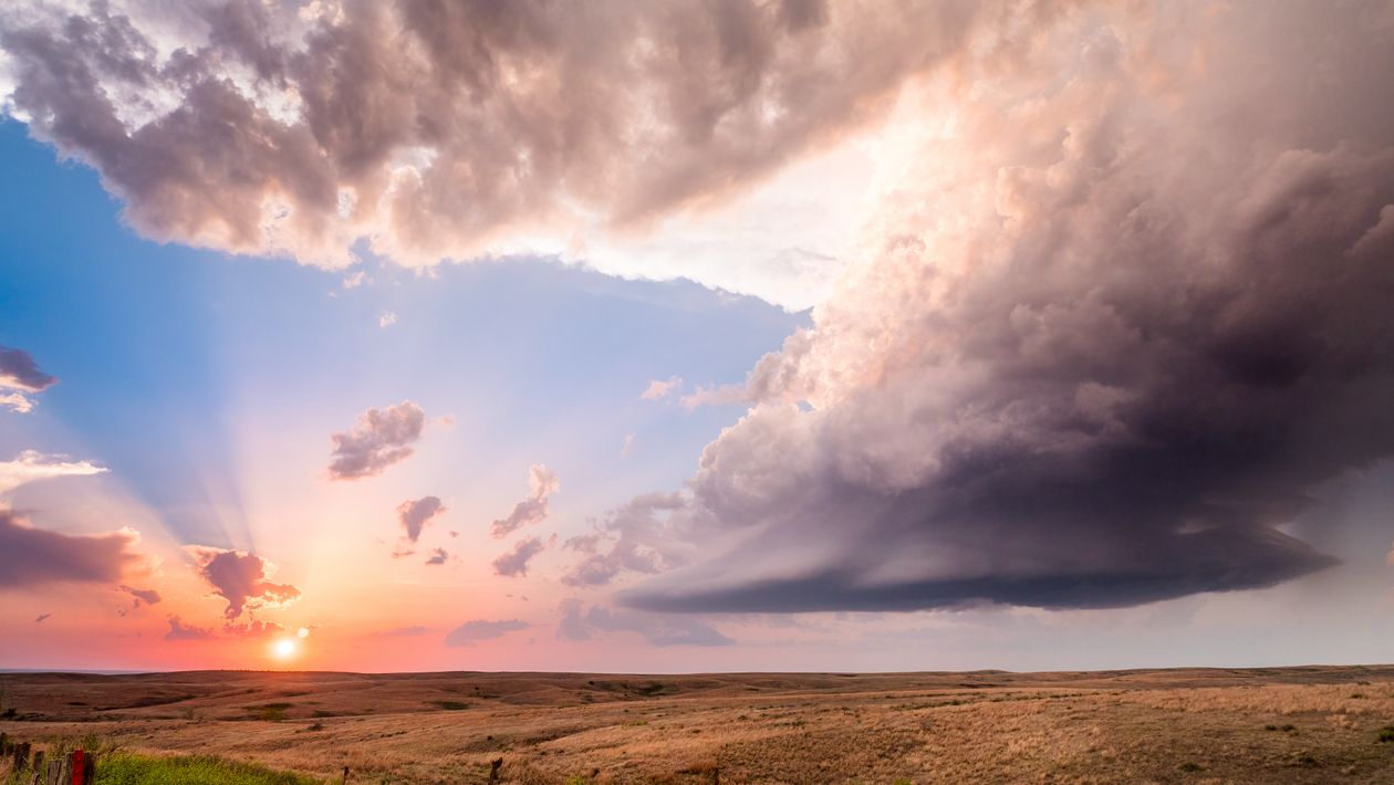 Dramatic Kansas Sunset Landscape with Storm Clouds · Free Stock Photo