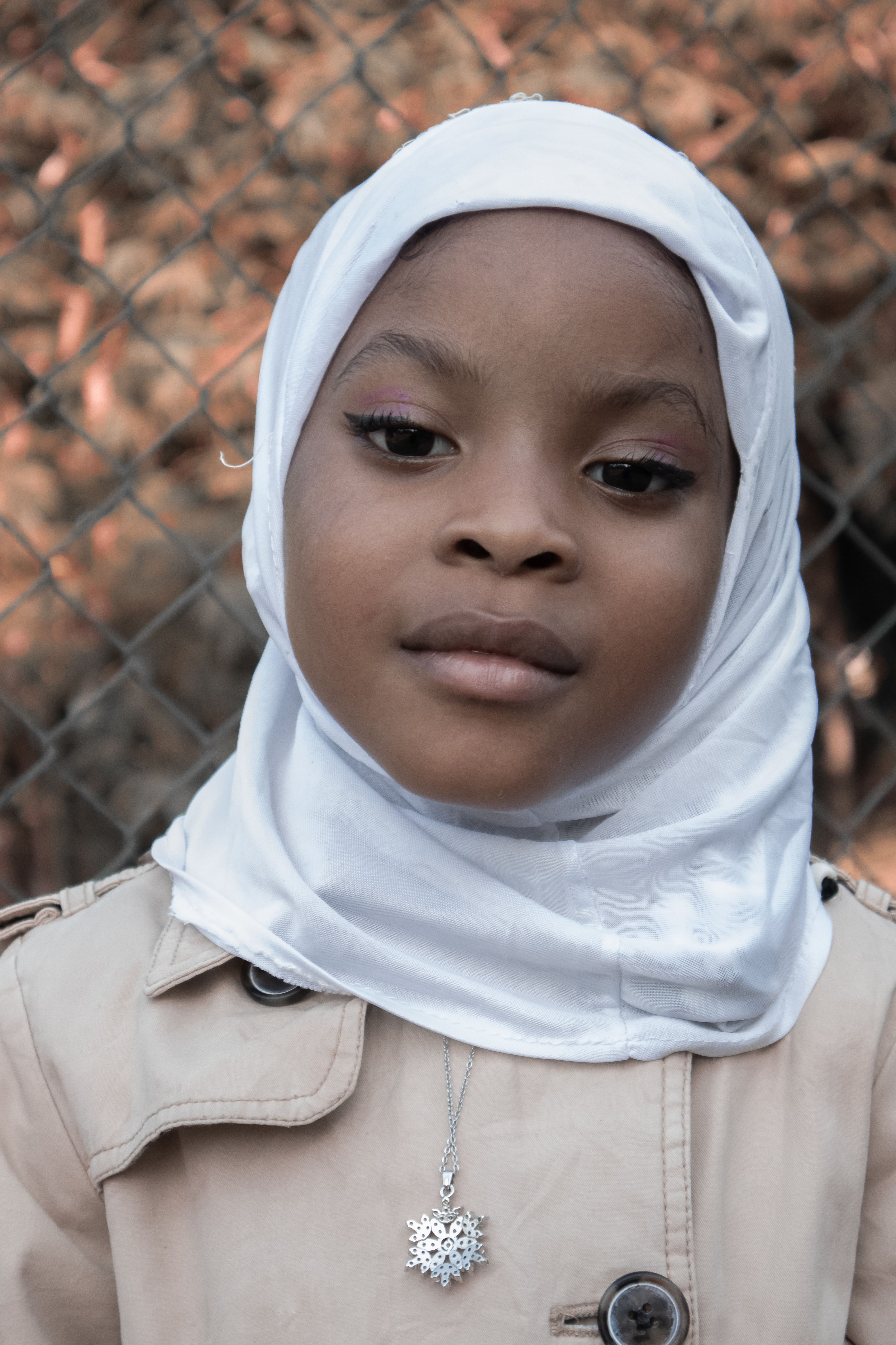 Portrait of a Young Girl in White Hijab · Free Stock Photo