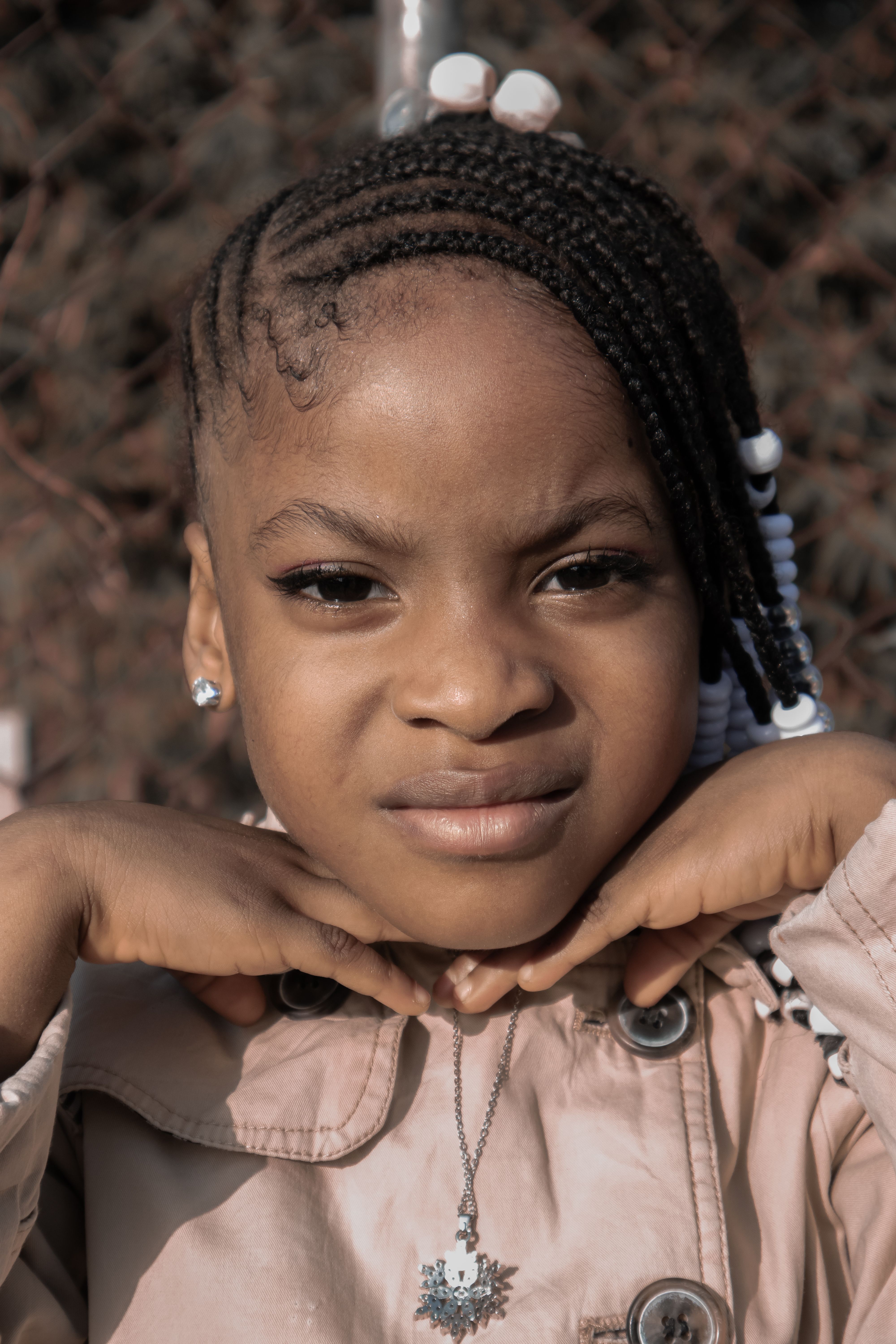 Portrait of Young Girl with Braided Hair Outdoors · Free Stock Photo