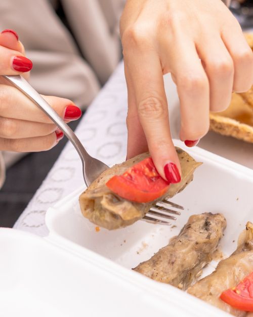 Free A close-up of traditional Arabic cuisine being enjoyed at a table in Santiago de Querétaro, Mexico. Stock Photo