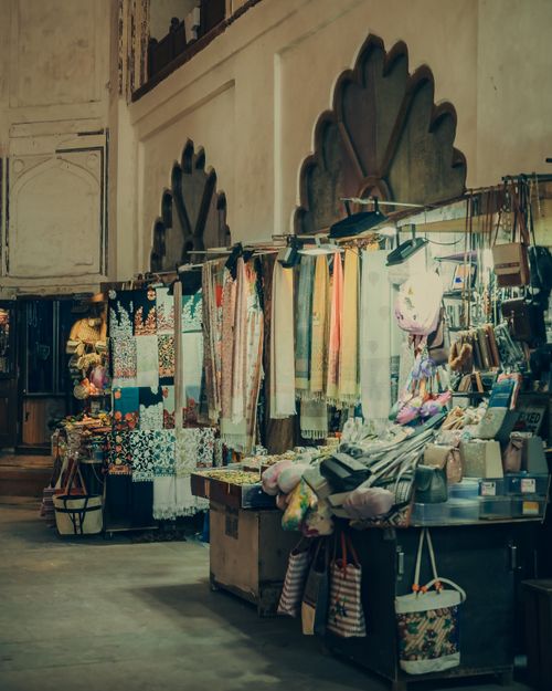 Free Intricate textiles and handicrafts displayed in Delhi's historic market inside Red Fort. Stock Photo