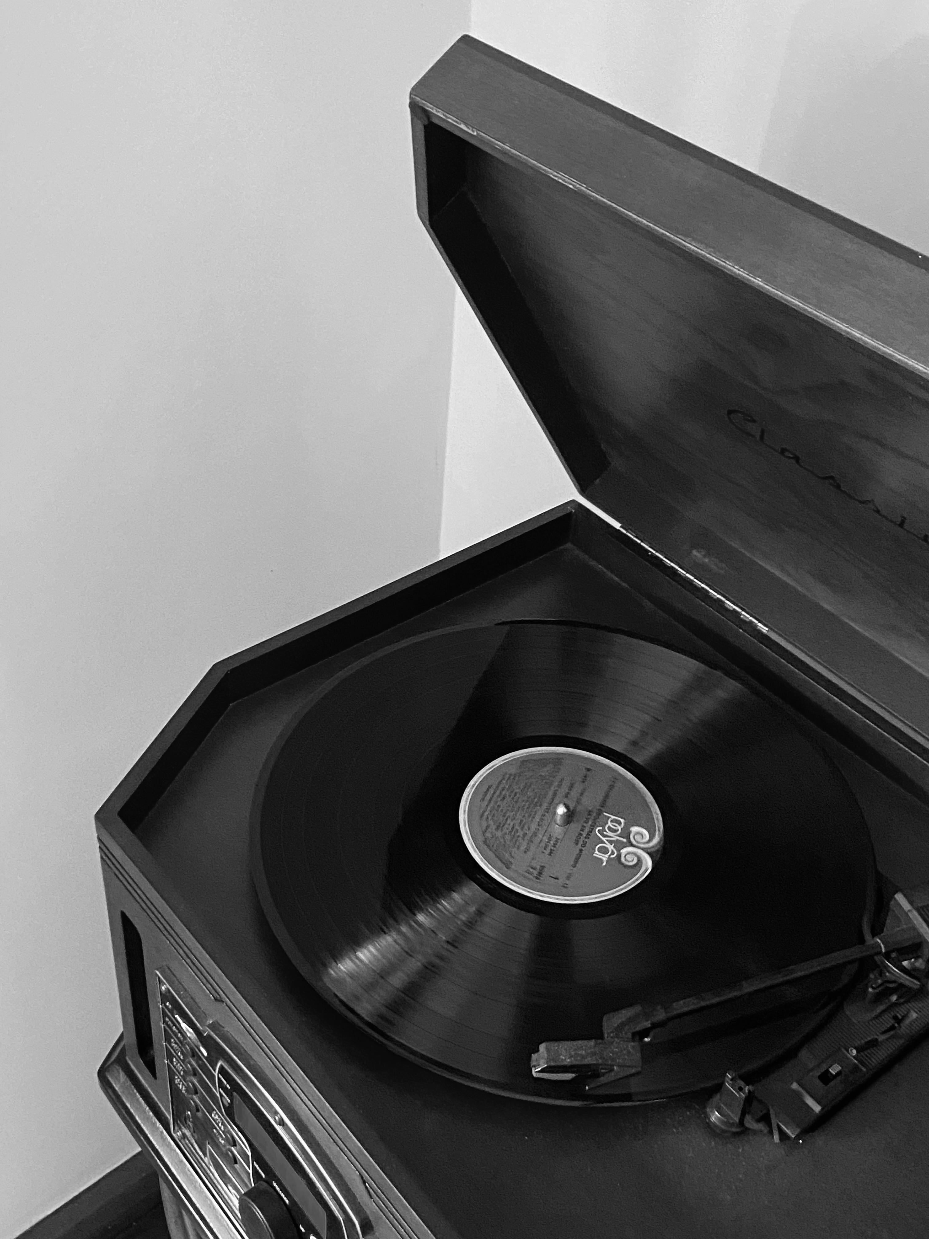 vintage record player with vinyl in black and white