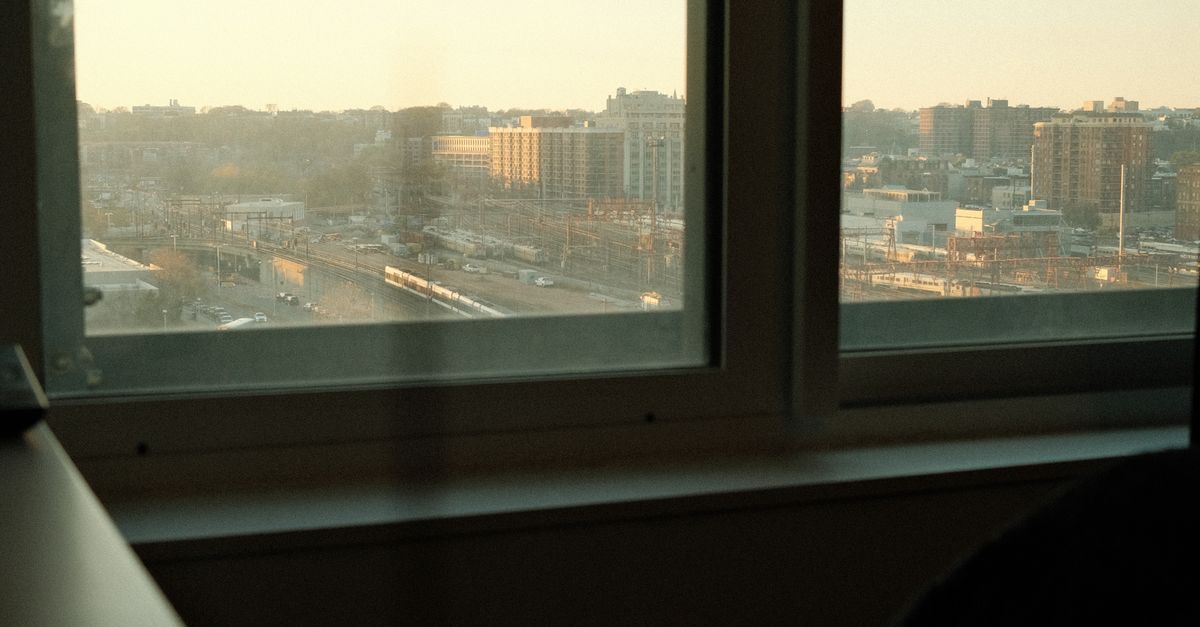 Cityscape View from a Window during Golden Hour · Free Stock Photo