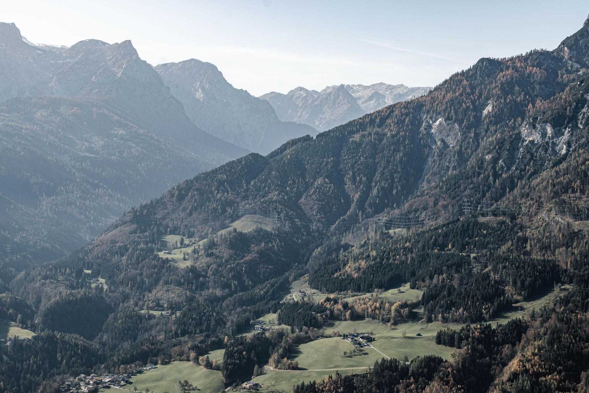 Breathtaking mountain landscape with lush valley and distant peaks, capturing the beauty of nature.