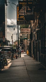 Atmospheric street view of Chicago with signs, bikes, and pedestrians in the urban landscape.