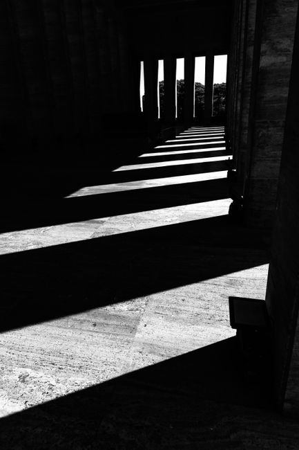 High contrast black and white photo of dramatic architectural shadows.