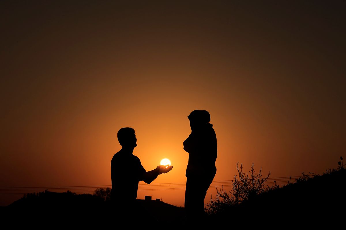 Silhouette of a Woman During Sunset · Free Stock Photo