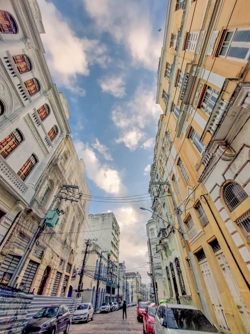 Free Charming city street in Recife with historic architecture and blue sky. Stock Photo