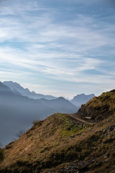 Beautiful mountain path with stunning views of Swiss Alps in Walenstadt, perfect for adventure lovers.