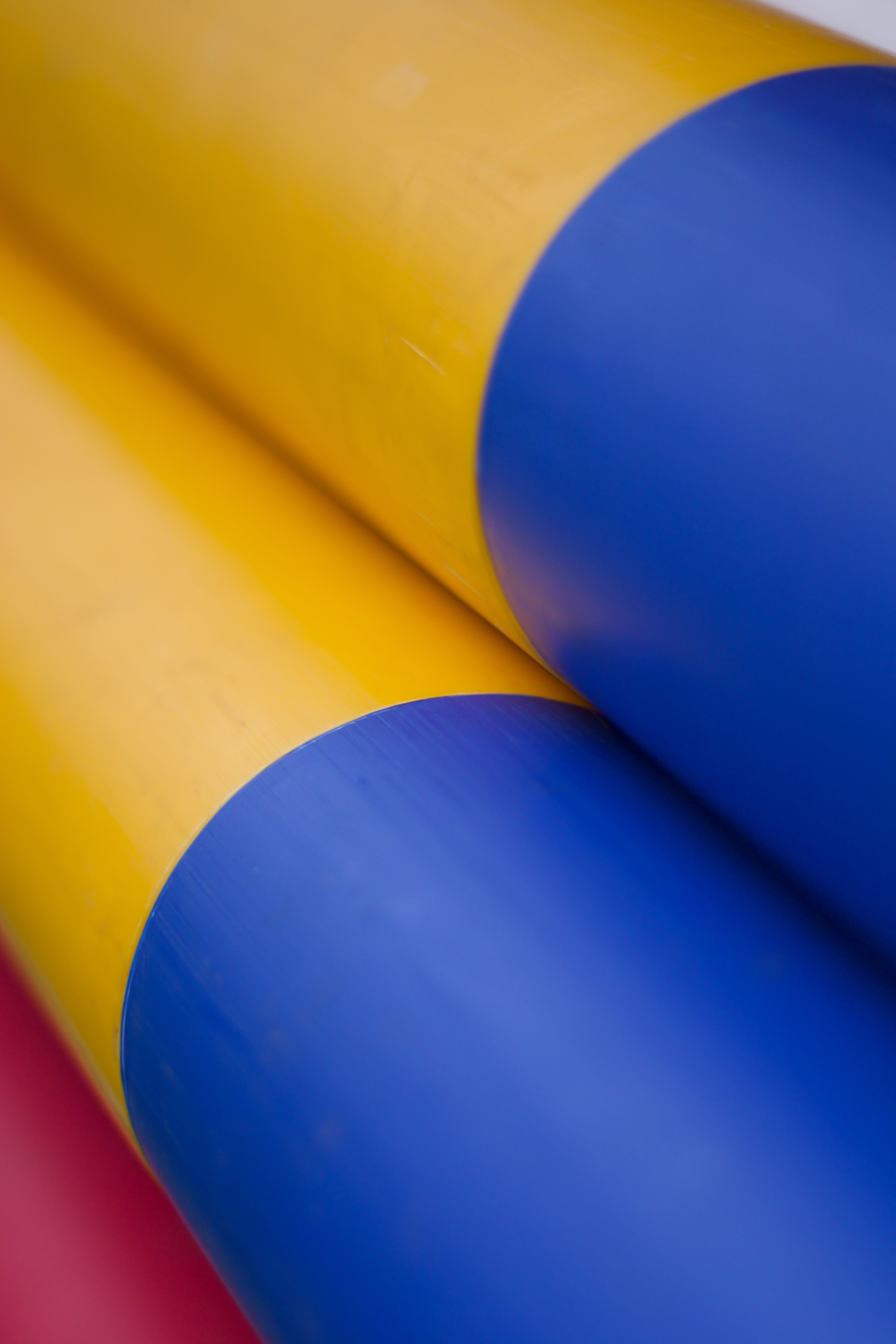 Colorful Tubes Close-Up with Abstract Design · Free Stock Photo