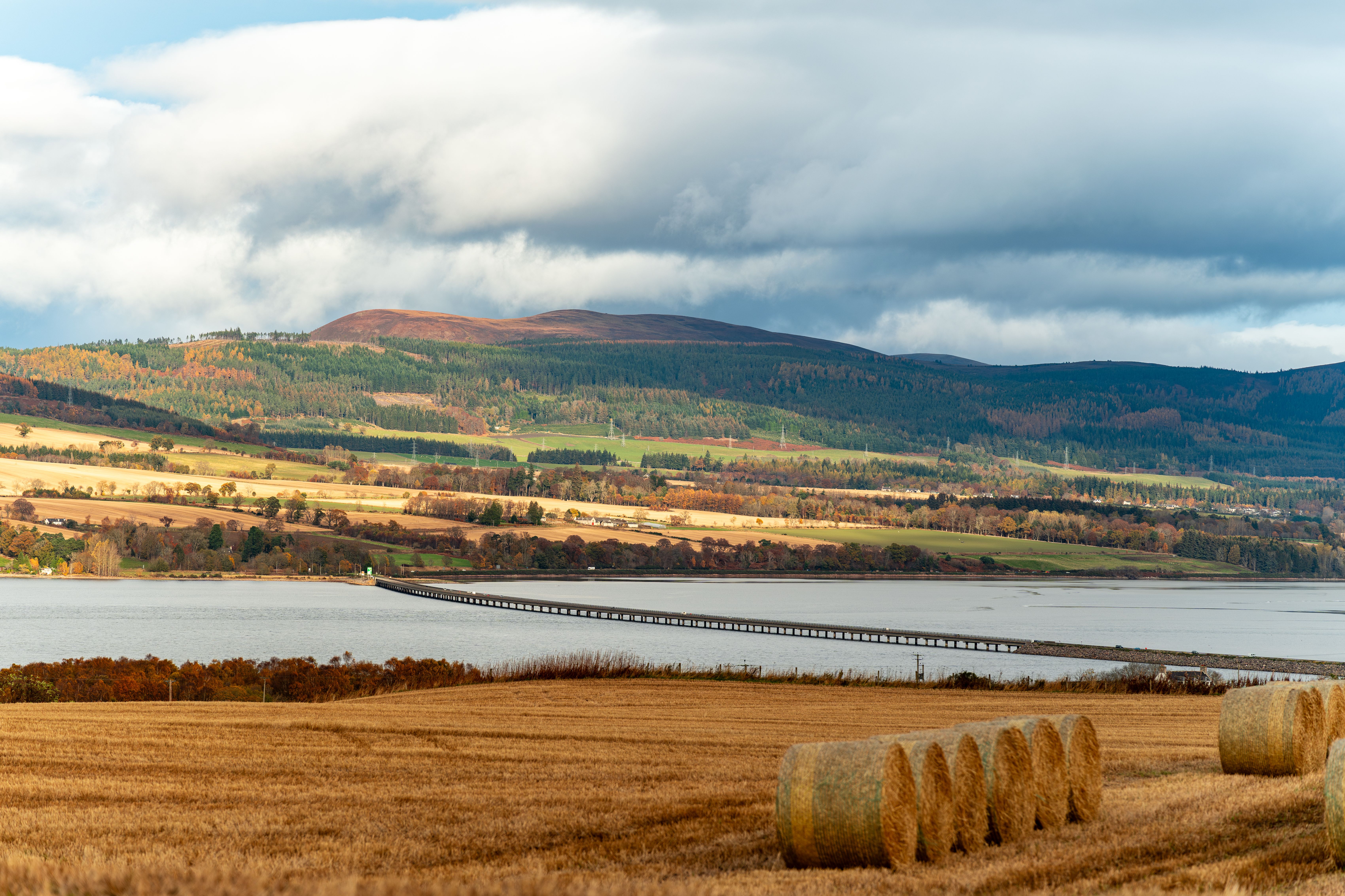 Scenic Autumn Landscape with Hay Bales · Free Stock Photo