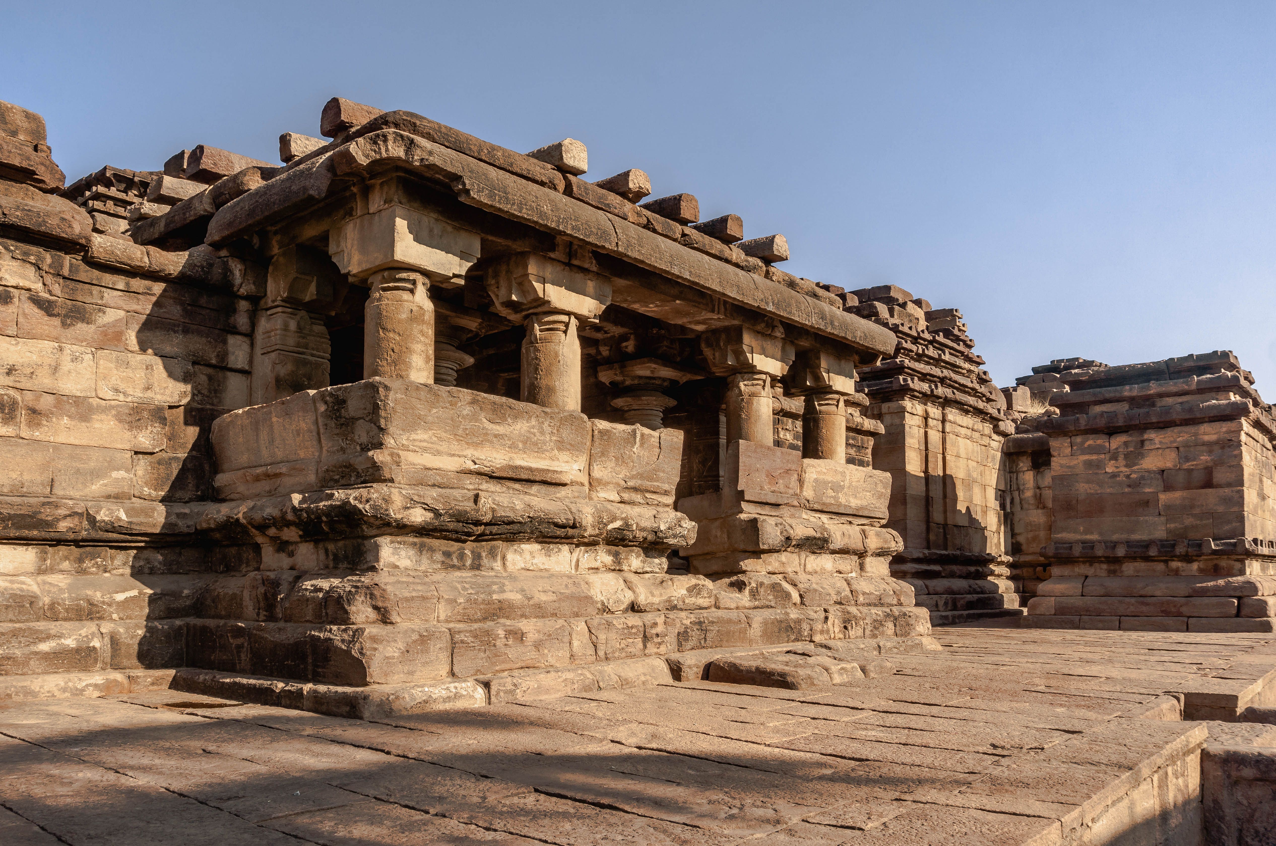Explore the historic stone temple architecture of Aihole, Karnataka, India. - Majuli